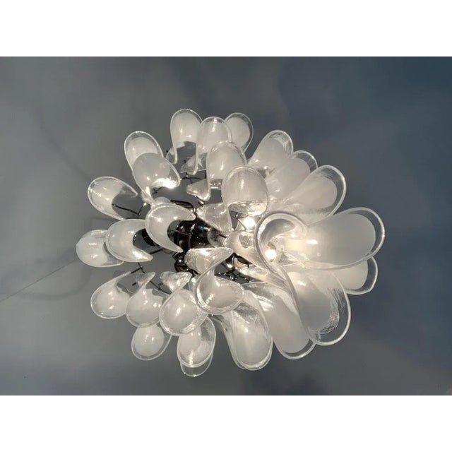 Contemporary Murano Glass "sella" chandelier with a kromo metal frame Spare parts glass included. Diameter = 60 cm = 23.4"...