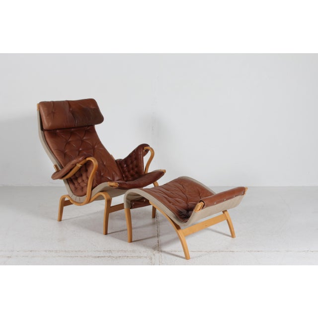 Scandinavian modern easy chair/ lounge chair model "Pernilla" manufactured by Dux of Sweden. Designed by architect and...