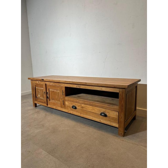 Bring warmth and character into your interior with this beautifully crafted vintage teak media cabinet. Made from solid...