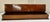 Substantial late 19th-century dresser casket box crafted in richly figured mahogany veneer, featuring an architectural...