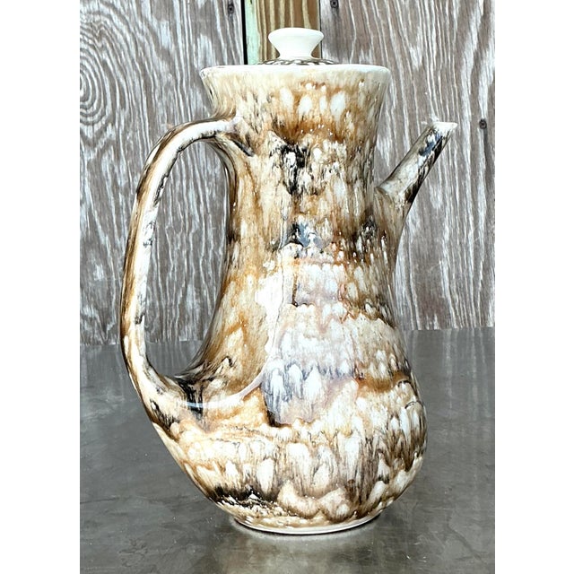 Enjoy a touch of French elegance with this Vintage French Drip Glaze Coffee Pot. Featuring a charming drip glaze finish...
