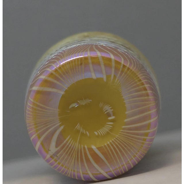 This stunning vintage art glass vase was made by the Durand Art Glass Shop in the early 20th century. It has a splendid...