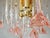 This vintage Italian pink floral chandelier adds a touch of elegance and charm to any room. Its delicate pink glass...