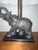 Elevate your space with this majestic vintage Hollywood Regency figural elephant table lamp by the esteemed Berman...