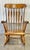 Classic Arrowback Windsor rocker by S Bent Brothers of Gardner Massachusetts. Crafted in solid maple with a wake amber...