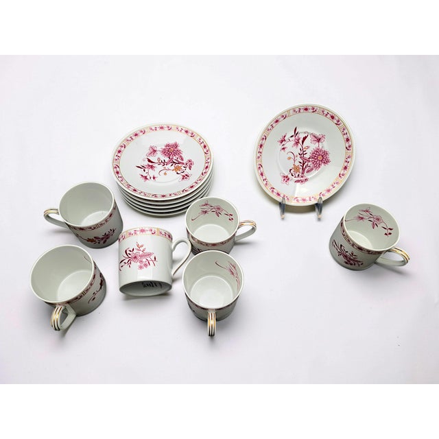 Bernardaud French porcelain set, "Pekin" design in shades of pink with Chinese-style gold accents. Add a touch of elegance...