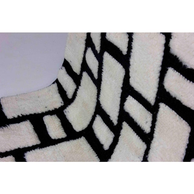 Vintage Tribal Moroccan Berber Rug: This striking rug features checkered white and black pattern with natural, organic...
