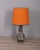 Floor lamp with decorated ceramic structure and large orange fabric lampshade, West German design, 1960s. This piece has...