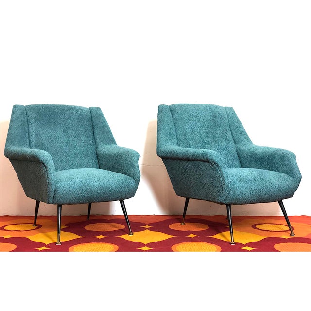 Pair of Vintage Armchairs from the 1960s, designed by Gigi Radice. The armchairs are Italian-made by Figli di Renzo...