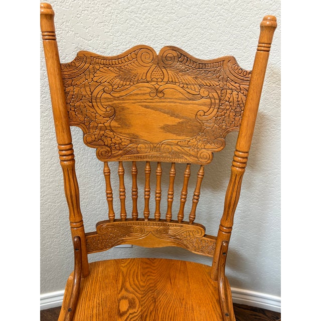Wood Vintage Carved Solid Oak Pressed-Back Dining Chairs – Captain & Side Chair Pair For Sale - Image 7 of 9