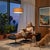 The Tambo Arc Lamp is a Mid-Century Modern floor lamp designed by Peter Morelli in 1984, featuring a satin nickel finish...