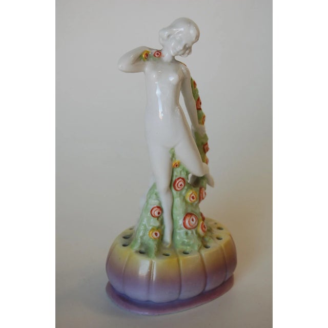 Art Deco Porcelain Floral Dancing Female Figurine Made In Germany. Numbered 3944. Measures 7.5" High x 4" Wide x 2.5" D