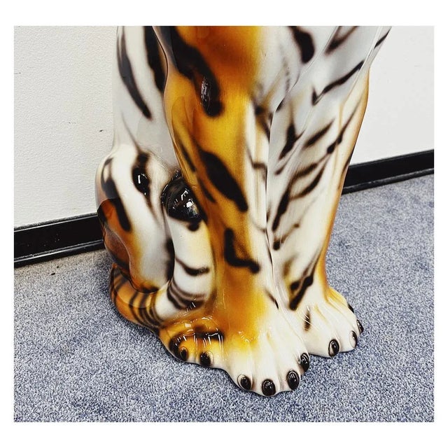 Unique handmade leopard statue. This Hollywood Regency style statue, crafted from hand-painted ceramic and made in Italy,...