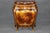 This exceptional Louis XV-style bombé commode is a particularly sumptuous example of the French decorative tradition,...