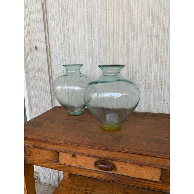 Glass Late 19th Century Set of 2 Green Glass French Demijohn Bottles with Woven Esparto Basket For Sale - Image 7 of 18