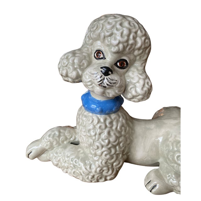 Adorable, hand painted mid century french poodle in the Staffordshire style. Adorably cute face with expressive eyes and...