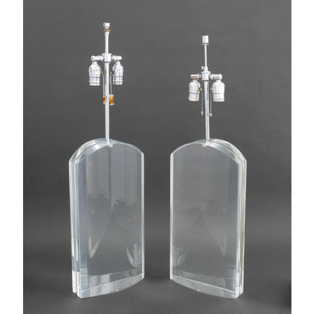 Pair of Modern Clear Acrylic and Chrome Table Lamps, one with cube form finial. Taller: 31.5" H x 9" W x 4" D. Provenance:...