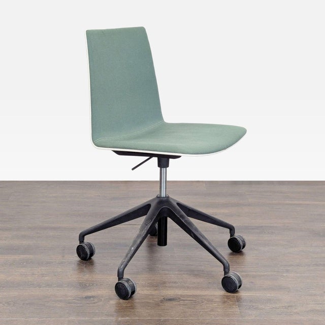This Andreu World chair is perfect for your office or home workspace. It features a simple, modern green seat and a sturdy...