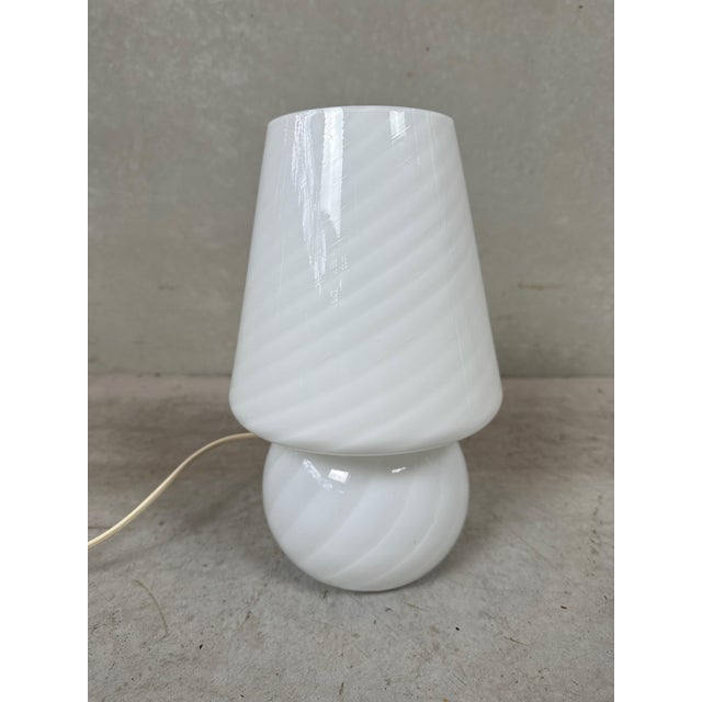 Table lamp in Murano glass in beautiful working condition. 'Swirl' motif in the glass. E27 socket. No cracks or chips....
