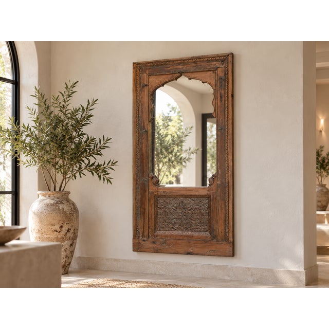 This stunning piece is a genuine fragment of ancient Indian architecture, originating as a window or door panel from a...