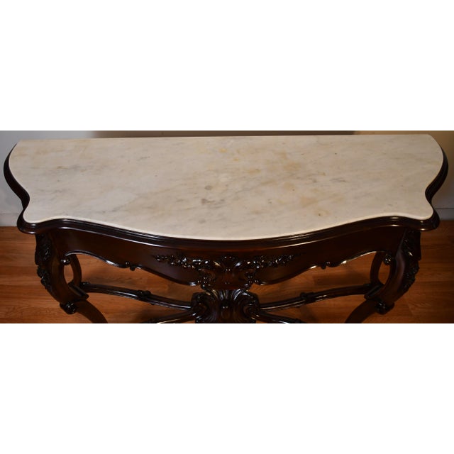 We are pleased to offer this beautiful antique French Louis XV console table, from the 1880s. This console is made of hand...