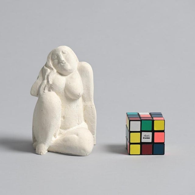 This sculpture in plaster was made by the Belgian artist Jan Keustermans. The statue has a rough plaster finish. It is a...