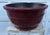 A large antique Chinese lacquered wood bowl, basin or tub contracted from wooden staves and iron hoop binding with wide...