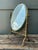 This exquisite 19th-century brass reliquary mirror is a rare artifact of Victorian elegance and sacred history. Originally...