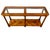 A vintage Neoclassical-style console table with a dual-panel inset glass top framed by rounded wood molding, allowing...