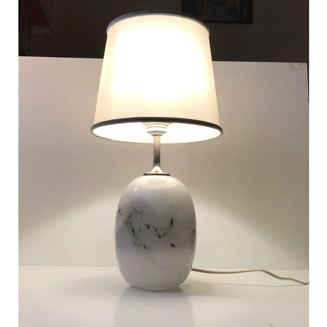 Ovoid shaped Art Glass Table Lamp was designed by Michael Bang and manufactured by Holmegaard in Denmark during the late...