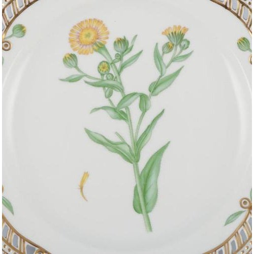 Royal Copenhagen Flora Danica openwork lunch plate in hand-painted porcelain with flowers and gold decoration. Model:...