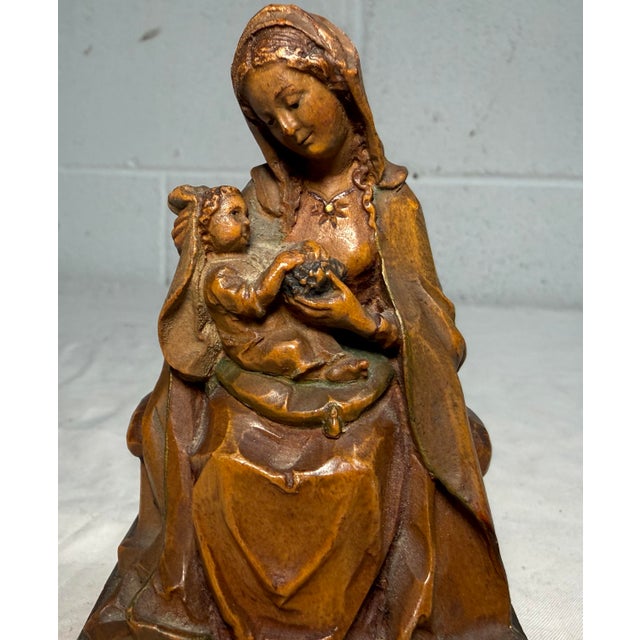Up for sale is a wonderful vintage hand carved wooden religious Virgin Mary holding baby Jesus sculpture. It's carved with...