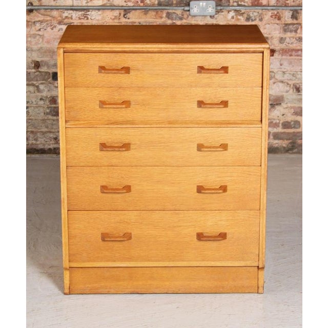 A mid century oak brandon range chest of five drawers produced by g plan, circa 1960s. Excellent restored condition. H:...