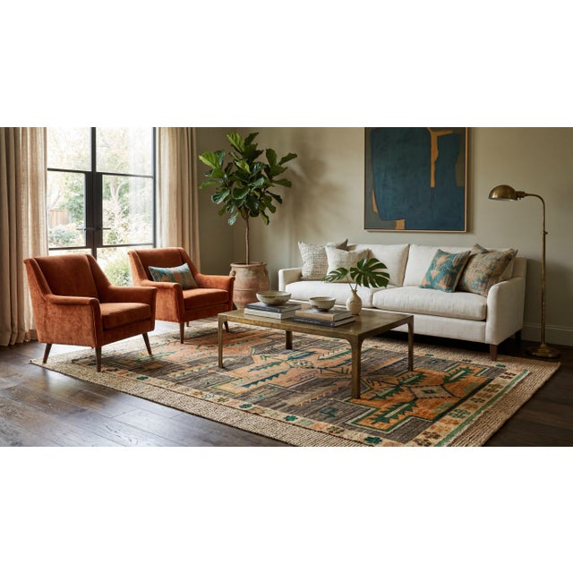 Elevate your space with this striking modern Baluch-style hand-knotted wool rug. Blending timeless tribal traditions with...