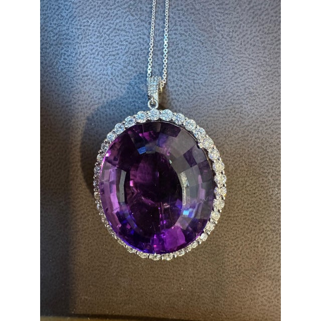 Approximately 80 Carat Amethyst & 3.5 Ct Diamond Pendant Necklace 14 Karat White Gold + Chain This spectacular Pendant...