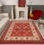 Enhance the ambiance of your home with this magnificent Persian-influenced Turkish hand-knotted rug made by skilled...
