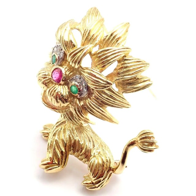 18k Yellow Gold Diamond Ruby Emerald Vintage Lion Dragon Pin Brooch by Cartier. Details: Metal: 18k Yellow Gold Stones:...