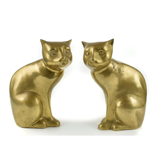 Add a touch of vintage charm to your bookshelf with this adorable pair of mid-century brass sitting cat bookends. These...