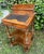 A hand-inlaid Davenport walnut writing desk sourced from a private Roman interior, decorated with delicate satinwood...