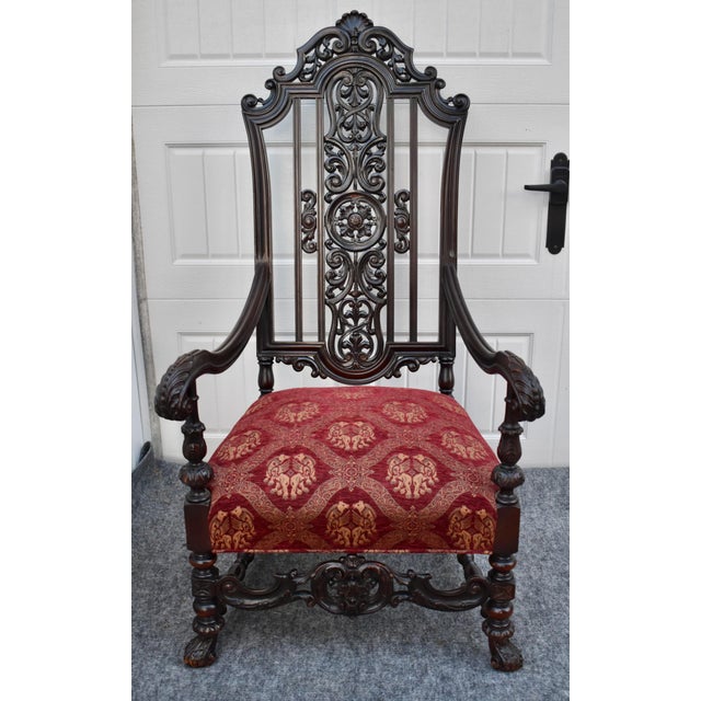 Vintage (1950's) High Back/Throne Chair has a Renaissance Revival Style. Carved Ornate Design. Dark Wood Finish. Walnut ?...