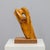 A sculptural abstract work by dutch artist h. Hinfelaar, carved from pear wood and mounted on a geometric wooden base. The...