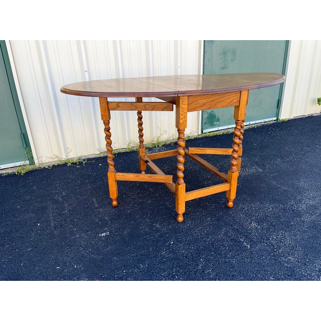 Early 1900's English Oak Barley Twist Oval Gate Leg Table For Sale - Image 9 of 12