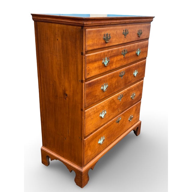 A beautiful early American Federal period chest of drawers crafted from solid cherry and dating to the early 19th century....