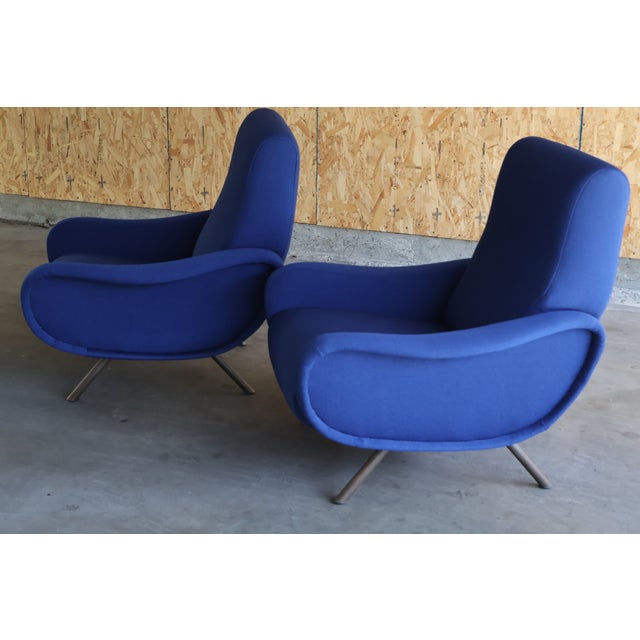 A pair of vintage early 1st edition Lady chairs designed by Marco Zanuso for Arflex, Italy, 1950s. The pain been restored...