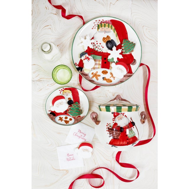 The Old St. Nick Cookie Plate from VIETRI's boxed gift collection is presented in a red pinstripe box and nestled in...