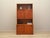The bookcase was made in the 1960s, Danish production. The structure is covered with teak veneer. The piece is placed on a...