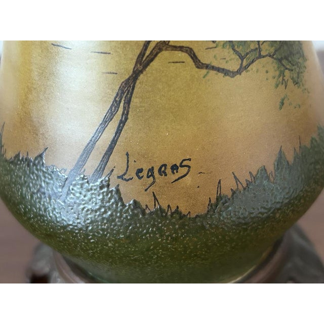 A refined pair of antique "long-neck" art glass vases, produced by the renowned Saint-Denis glassworks (Paris) during the...