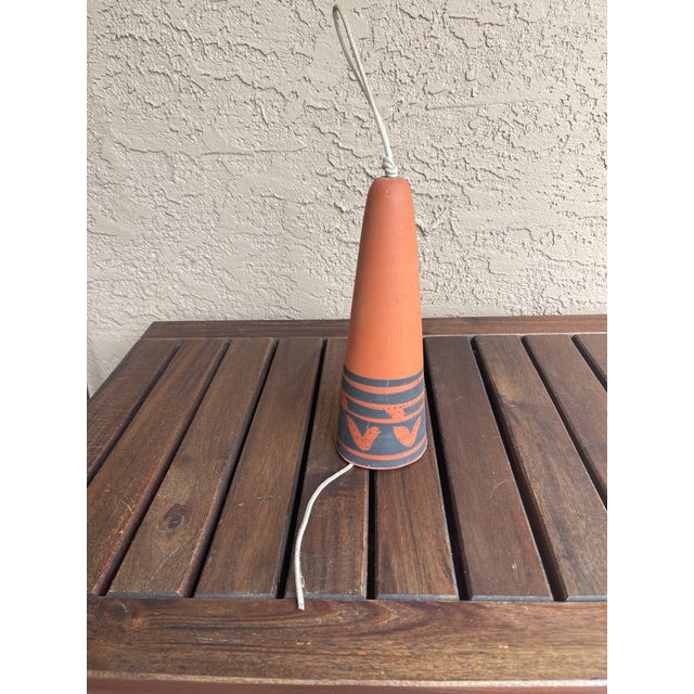 Here is a wonderful USA Pacific Stoneware Inc Bell Chime in Red Stoneware Clay. Love the painted red and simple black...