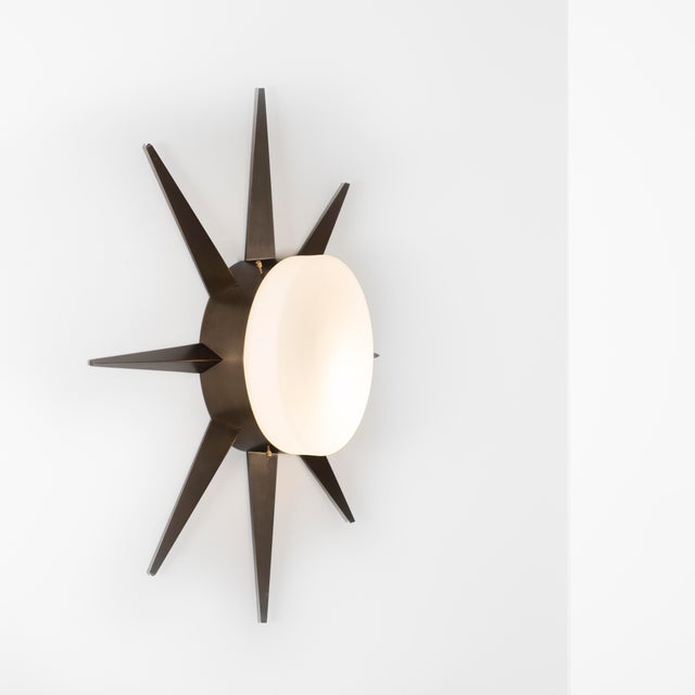 The Solare Punk Wall / Ceiling Light brings elegance to midcentury design through the inspiration of Italian design -...