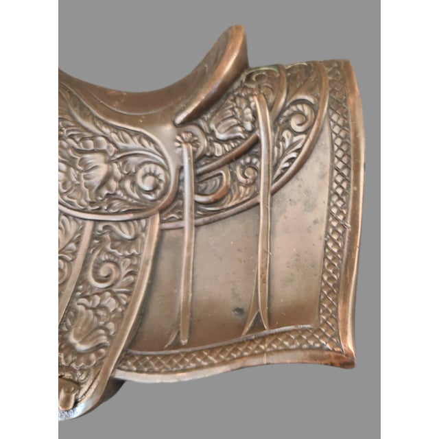 Add a touch of the Wild West to your desk with this antique JB # 1728 copper saddle trinket holder. Crafted by Jennings...